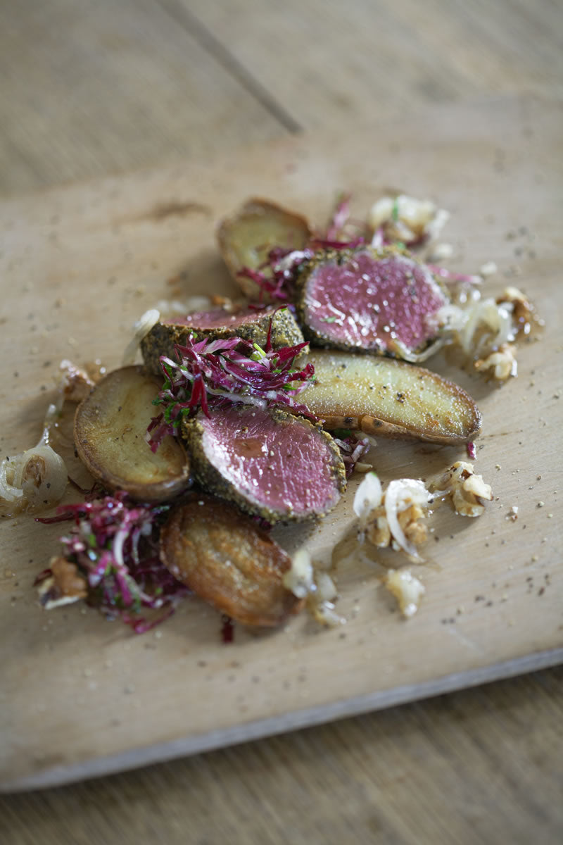 Peppered Venison served rare with Shetland Black potatoes.